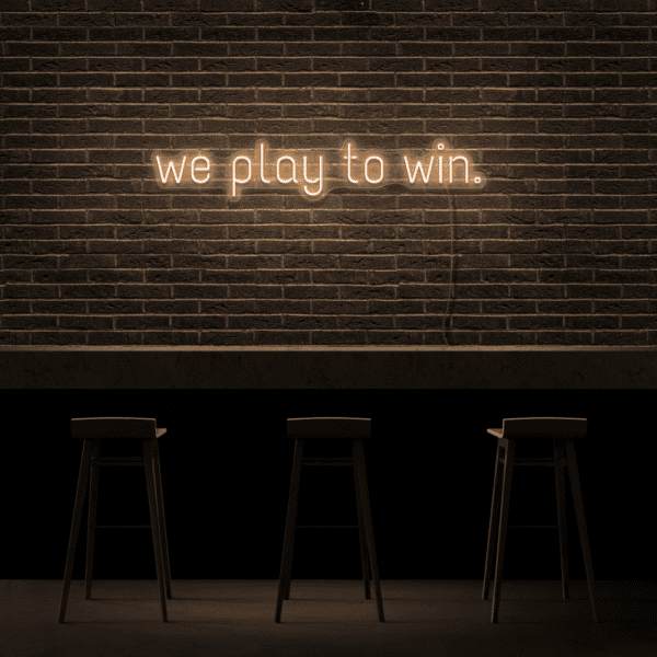 we play to win neon sign